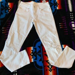 Levi’s 711 skinny ripped jeans